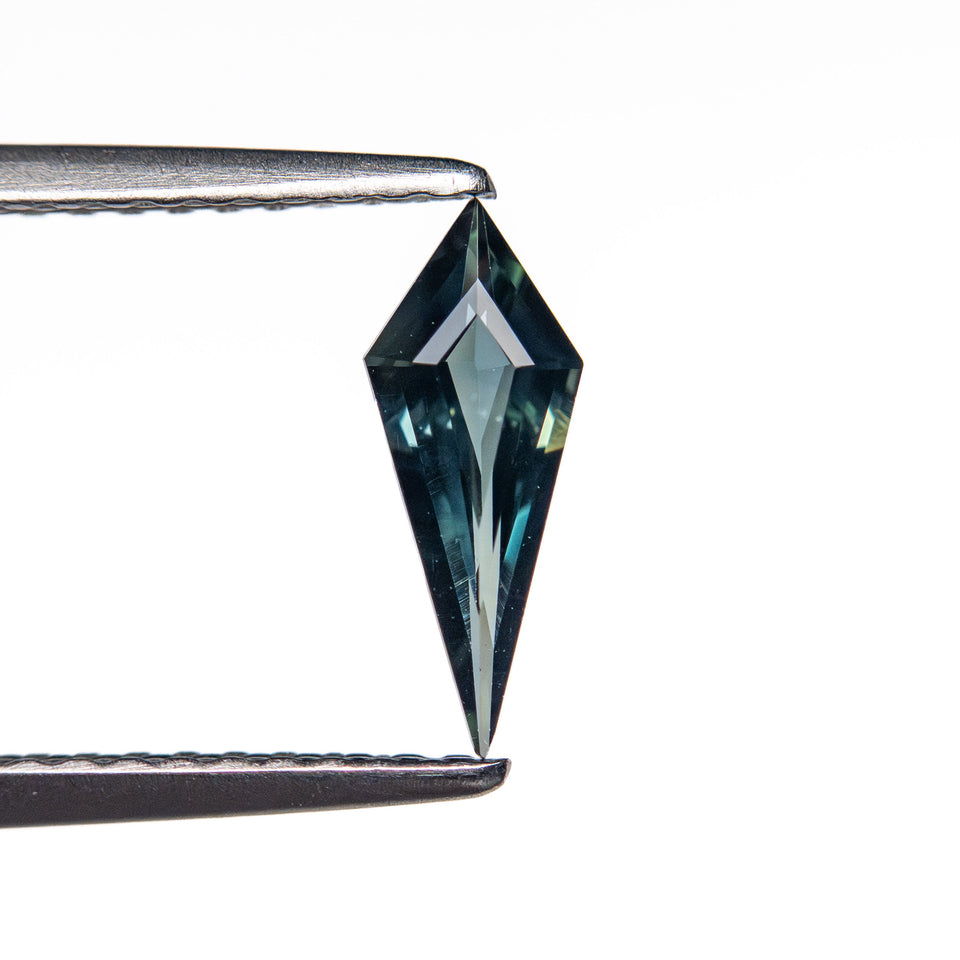 0.42ct 9.69x3.83x2.16mm Kite Step Cut Sapphire 25740-21