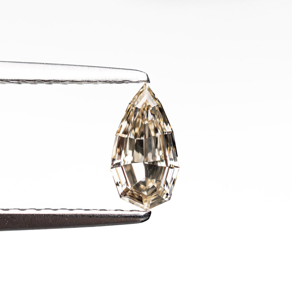 0.38ct 6.98x3.79x2.04mm VS1 C3 Geo Pear Step Cut 🇿🇦 26109-06