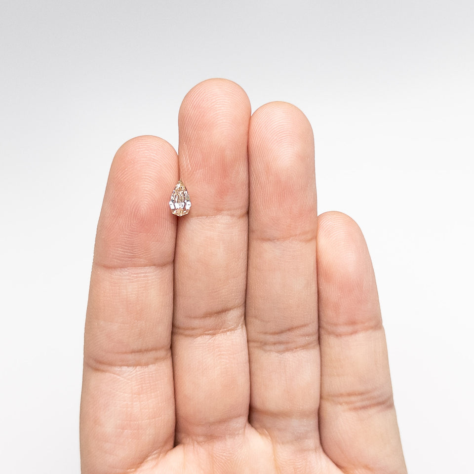IN SHOP _ 0.60ct 7.53x4.37x2.74mm Geo Pear Step Cut 26109-17