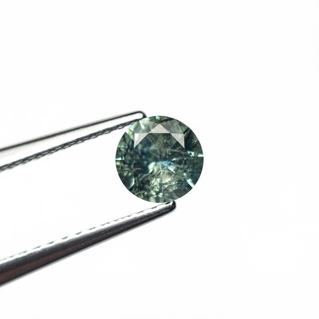 0.59ct 5.17x5.13x3.10mm Round Brilliant Sapphire 26556-21