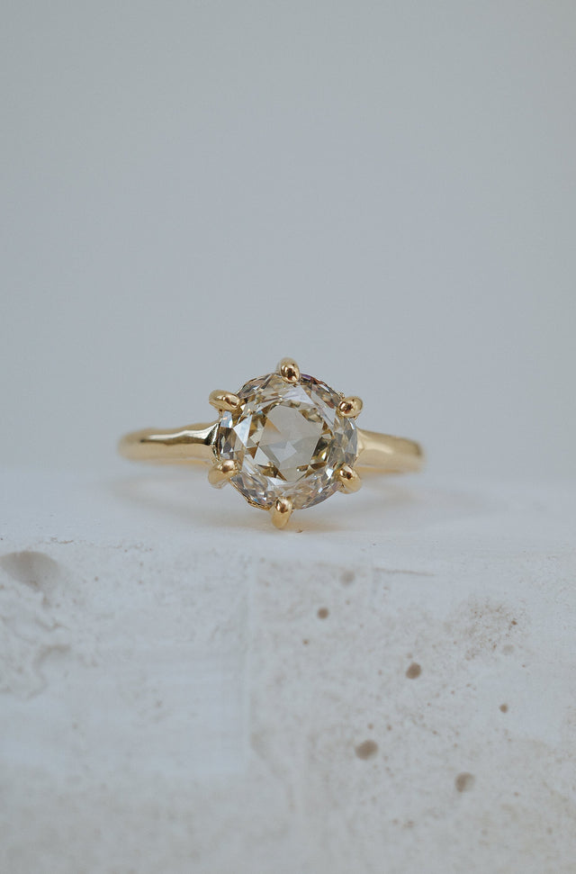 Six prong gold ring with modern antique round rosecut diamond