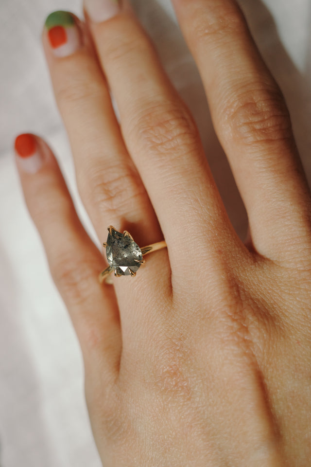 Talon Claw Pear Diamond Solitaire
