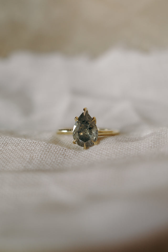 Talon Claw Pear Diamond Solitaire