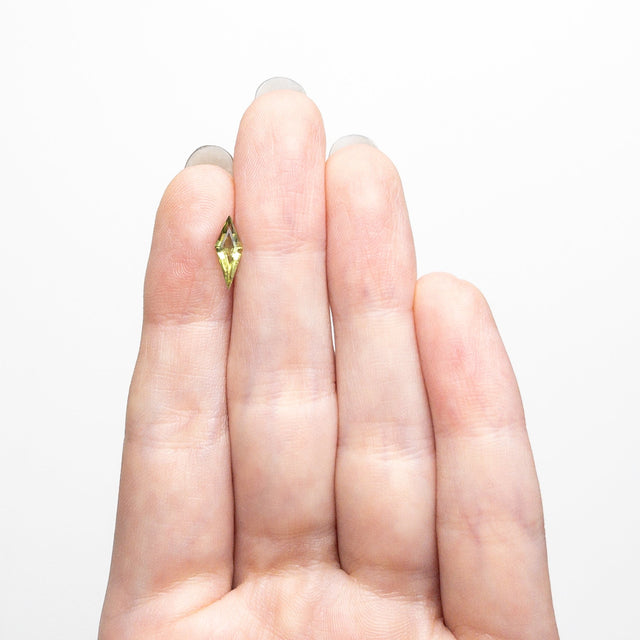 IN SHOP _ 0.63ct 10.86x4.14x2.56mm Kite Step Cut Sapphire 25740-15