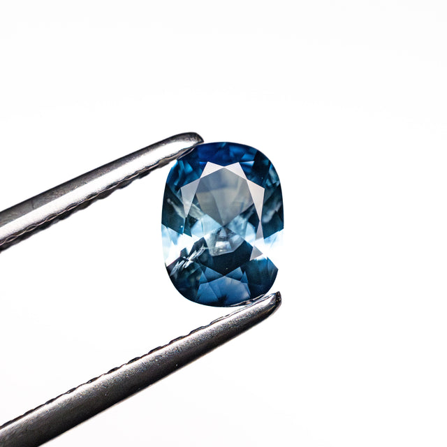 0.64ct 6.32x4.62x2.69mm Cushion Brilliant Sapphire 26673-11