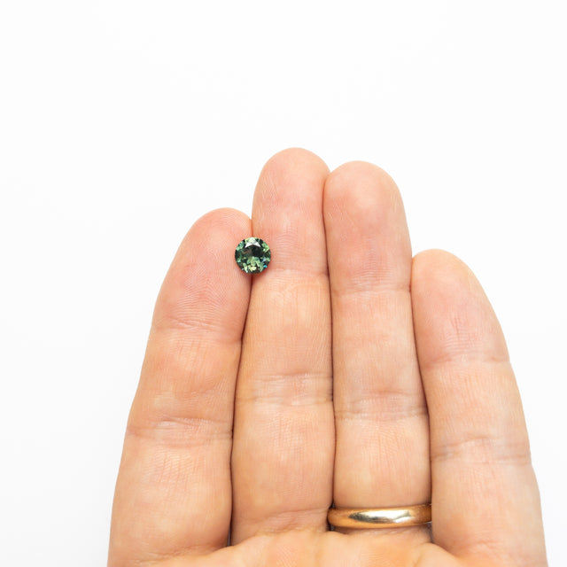 IN SHOP _ 1.76ct 7.30mm Round Brilliant Green/Teal Parti Sapphire