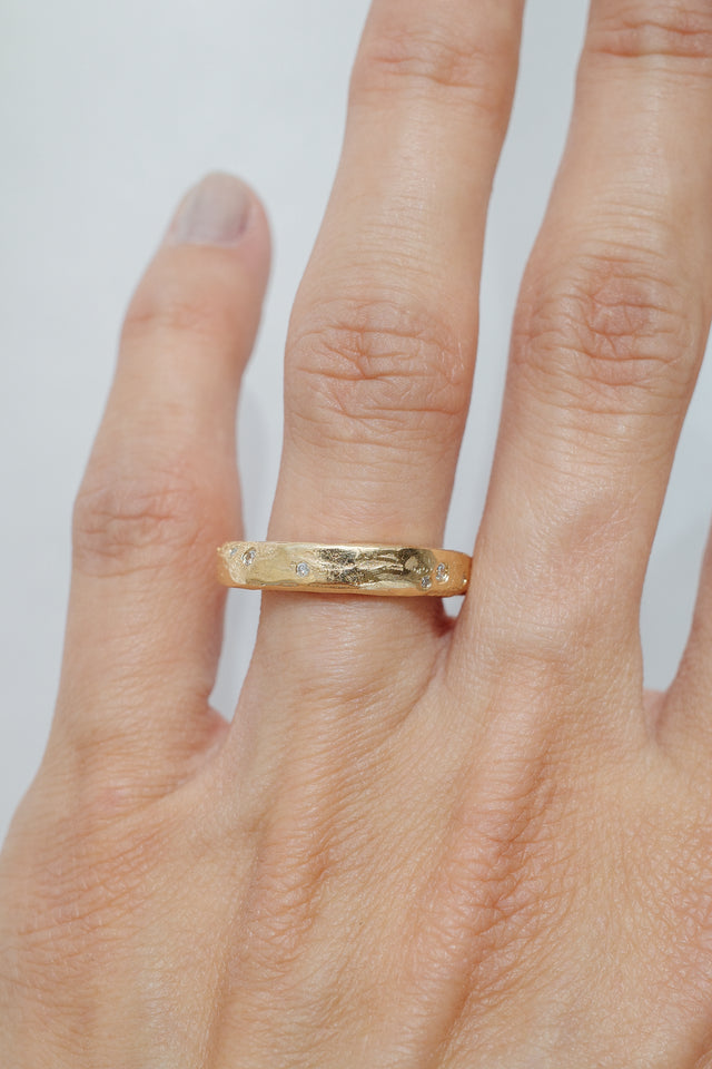 Eroded Flat Band in Fairmined Gold with Salt + Pepper Diamonds
