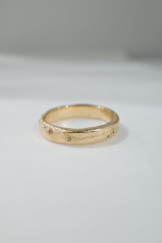 Eroded Flat Band in Fairmined Gold with Salt + Pepper Diamonds