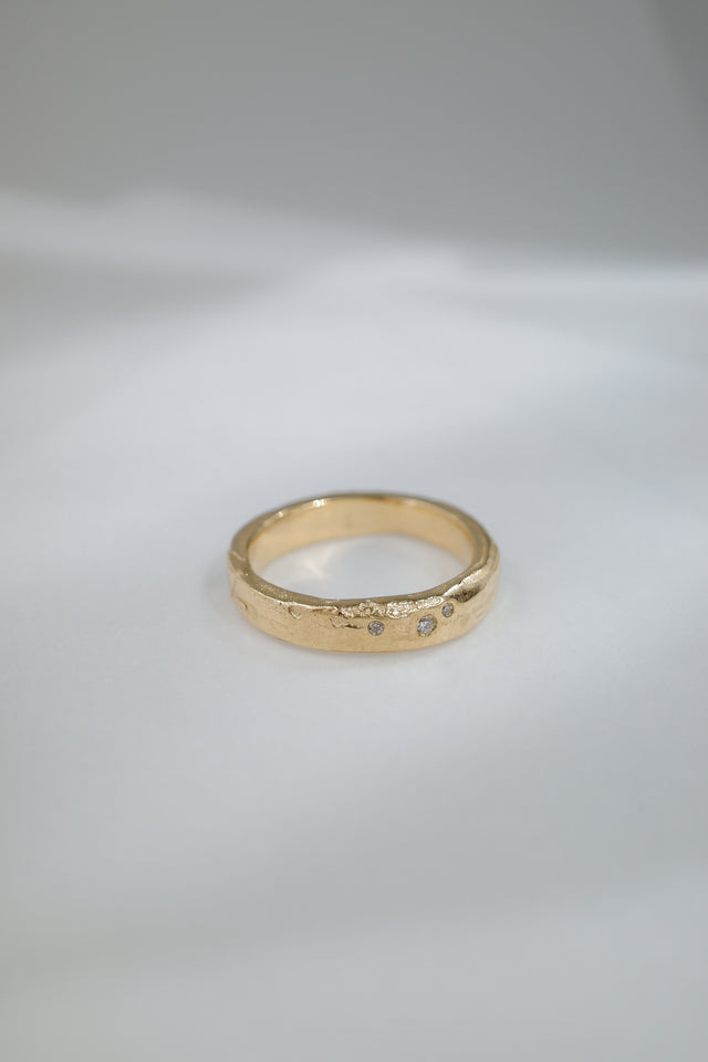 Eroded Flat Band in Fairmined Gold with Salt + Pepper Diamonds