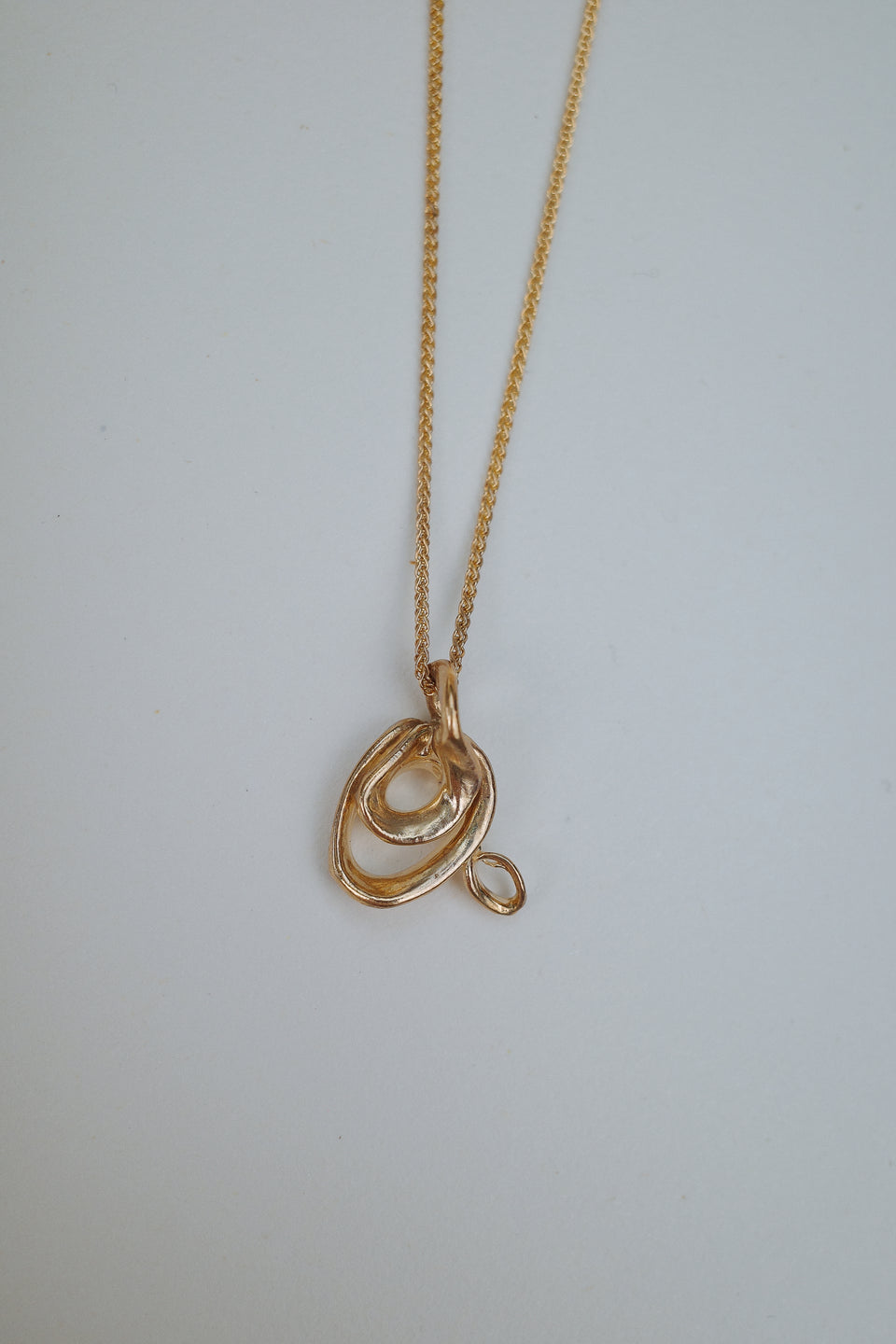 Gold Swirl Pendants