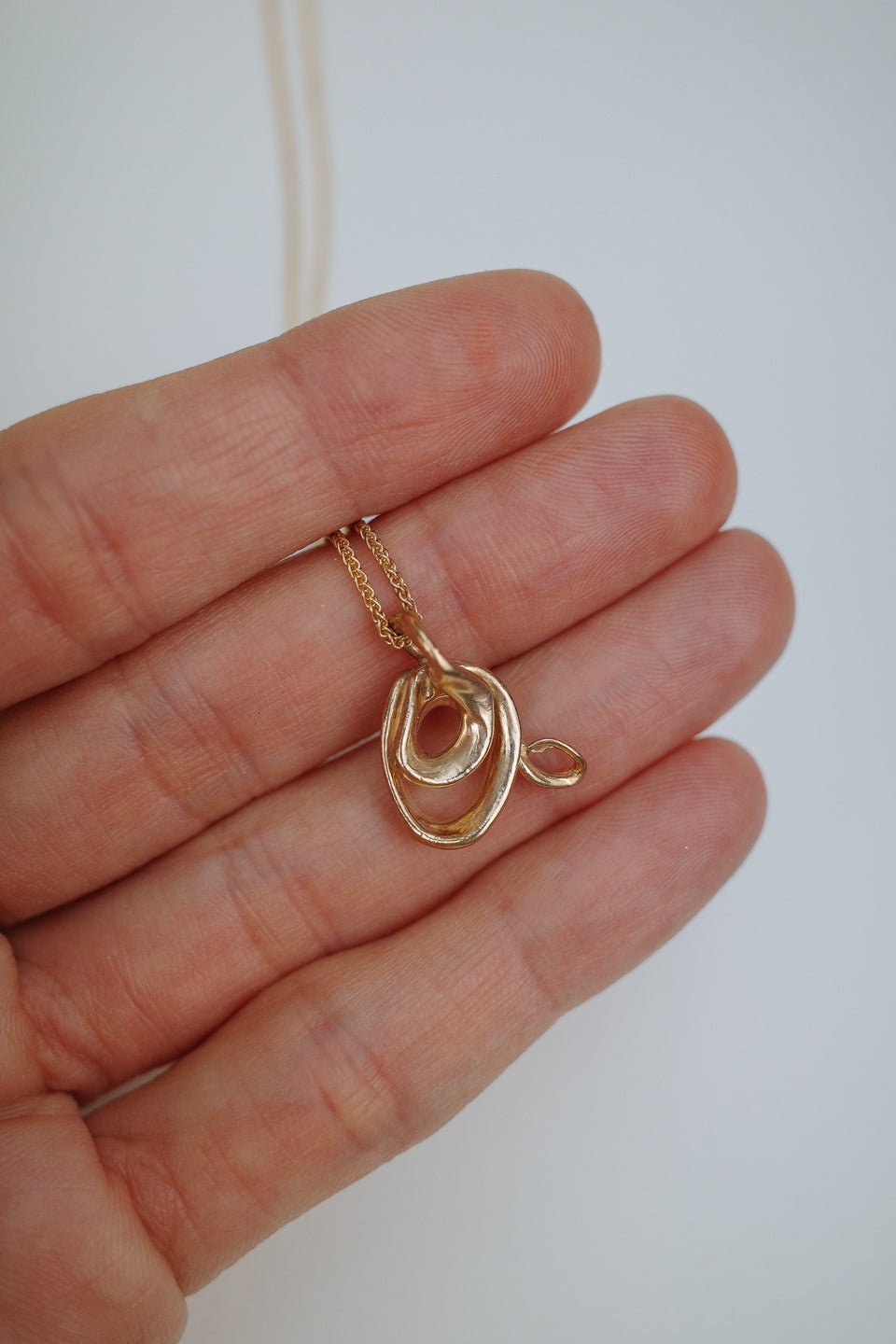 Gold Swirl Pendants