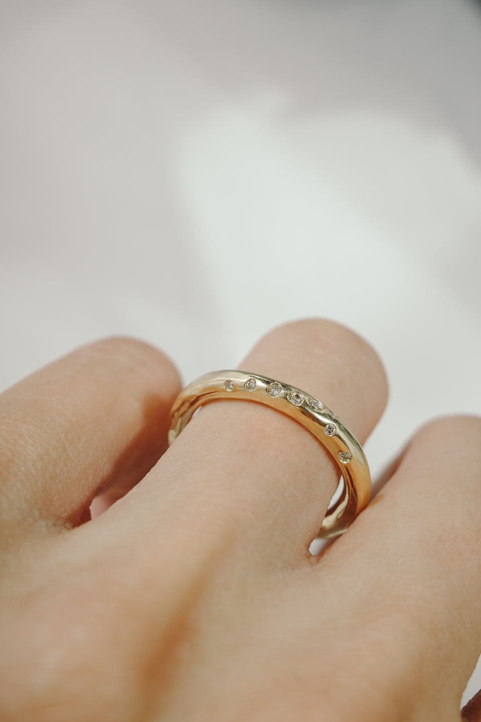 Orbital Round Band in Fairmined Gold with Champagne Diamonds