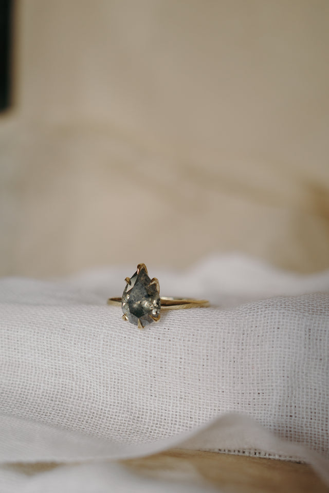 Talon Claw Pear Diamond Solitaire