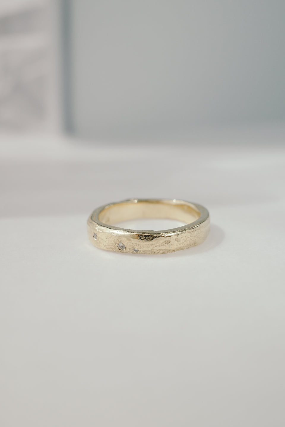 Eroded Flat Band in Fairmined Gold with Salt + Pepper Diamonds