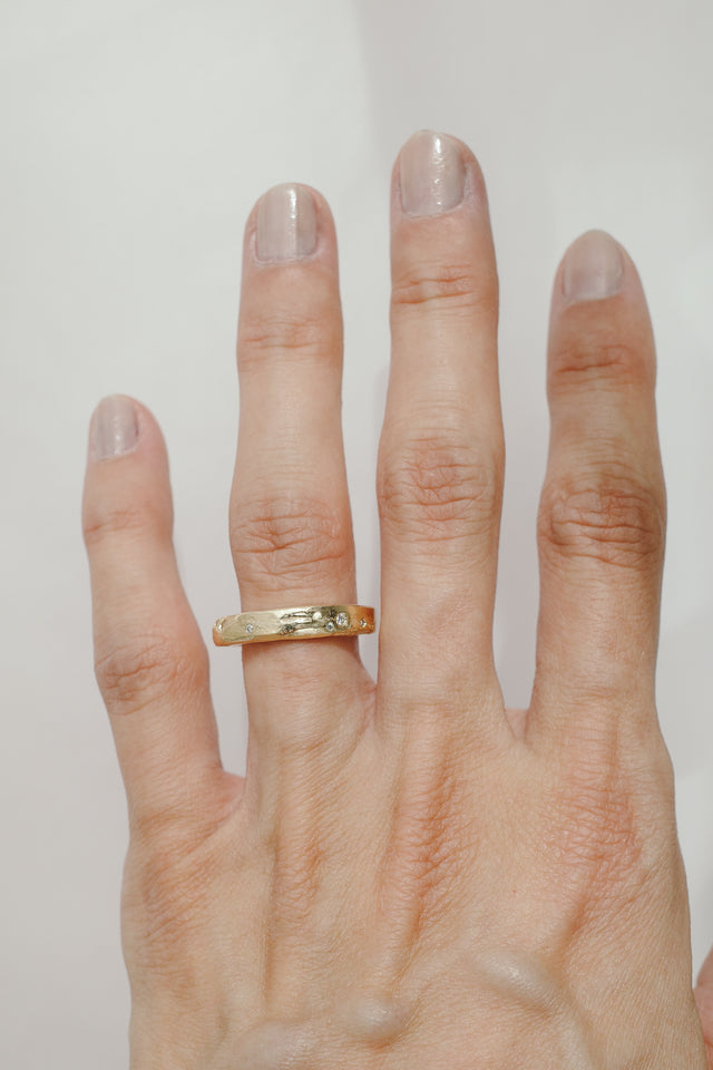 Eroded Flat Band in Fairmined Gold with Salt + Pepper Diamonds