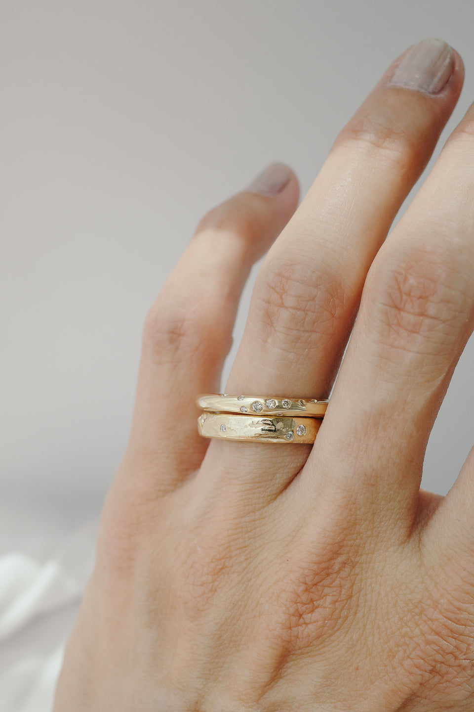 Eroded Flat Band in Fairmined Gold with Salt + Pepper Diamonds